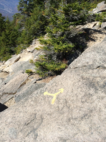 It is much easier to find the turn off for the Kate Sleeper trail if you look for this symbol painted on the rocks of the South Tripyramid Slide.  At the three way intersection symbol, the Kate Sleeper Trail goes off to the left if you are descending.